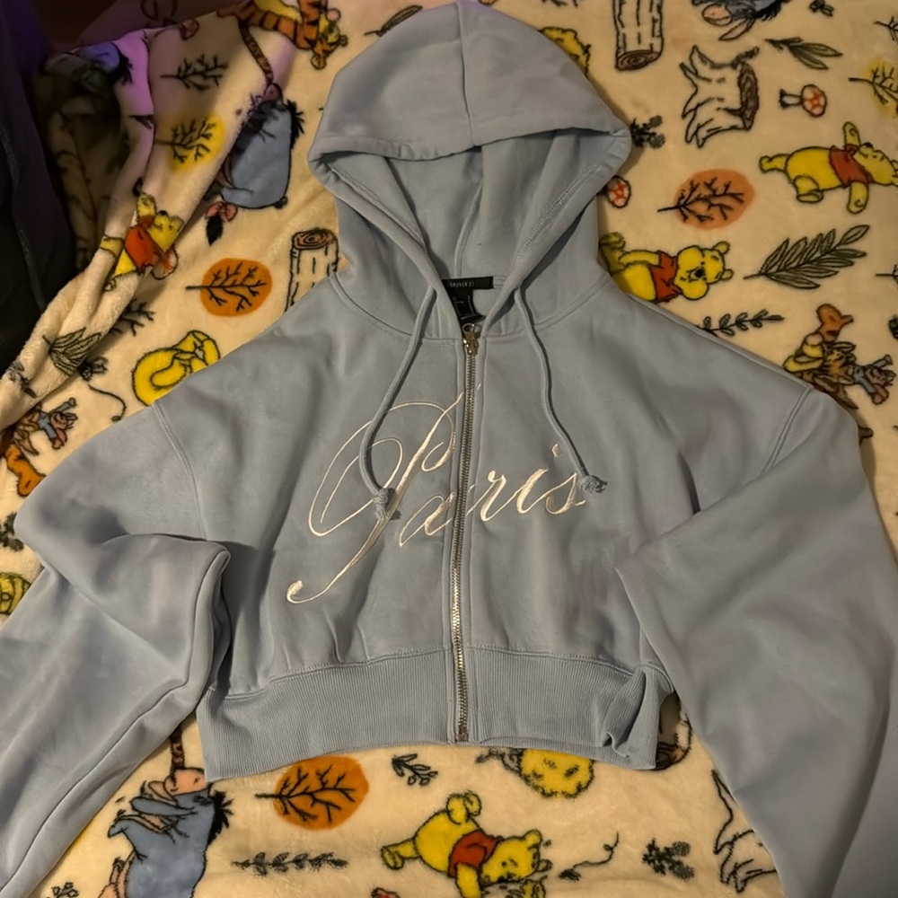 Light blue Paris cropped zip up